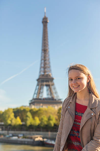 istock Happy Young Female Tourist With the Eiffel Tower 494996026