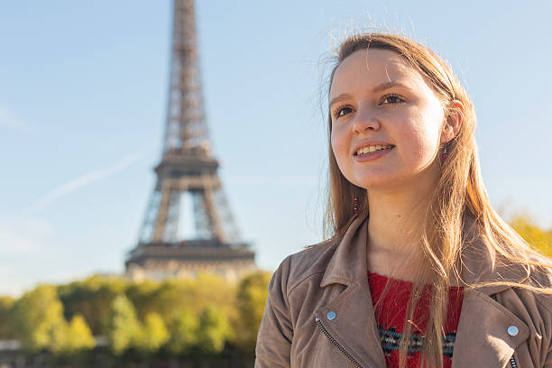 istock Happy Young Female Tourist With the Eiffel Tower 494996392