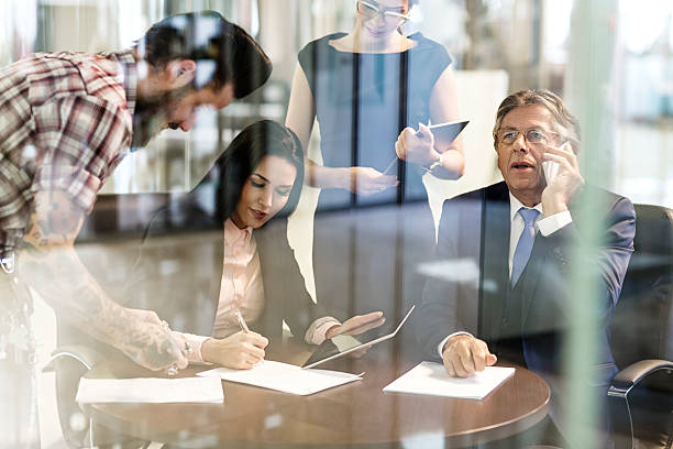 istock Group of multi-tasking creative people working in the office 494997364