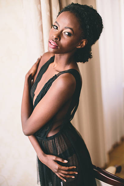 istock Young black woman in the room 494997392