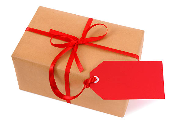 istock Brown paper package or gift with red gift tag 494997408