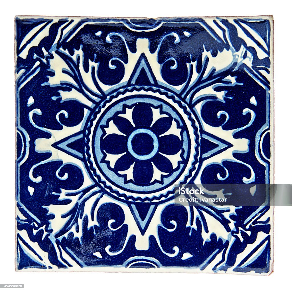 Talavera Handcrafted Mexican Ceramic Tile Handcrafted, hand-painted Mexican Ceramic Tile. Mexican tiles are concave (not perfectly flat). They are characterized as unique and irregular. Stenciled ceramic glaze suggest soft focus and edges.Handcrafted, hand-painted Mexican Ceramic Tile. Mexican tiles are concave (not perfectly flat). They are characterized as unique and irregular. Stenciled ceramic glaze suggest soft focus and edges.Handcrafted, hand-painted Mexican Ceramic Tile. Mexican tiles are concave (not perfectly flat). They are characterized as unique and  irregular. Stenciled ceramic glaze suggest soft focus and edges. 2015 Stock Photo