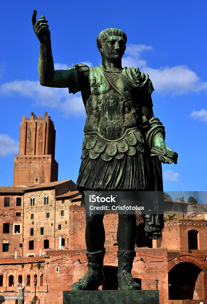 Caesar Augustus Traianus the victorious Emperor Trajan with his forum and Torre delle Milizie in the backgorund 2015 Stock Photo