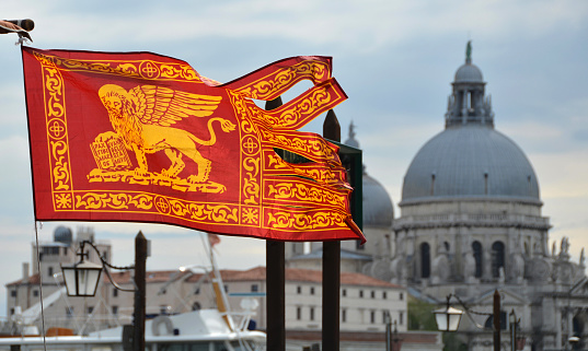 Serenissima old flag with Salute Basilica in the backgorund
