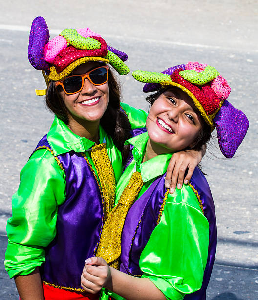 Barranquilla, Colombia - March 1, 2014: Barranquilla, Colombia - March 1, 2014 - Performers in elaborate costume sing, dance, and stroll their way down the streets of Barranquilla during the Battalla de Flores the pinnacle of the Carnival de Barranquilla parades.