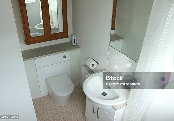 Image Of A Modern En Suite Bathroom With White Sink Stock Photo - Download Image Now
