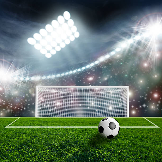 istock Soccer ball on green stadium arena 495004845