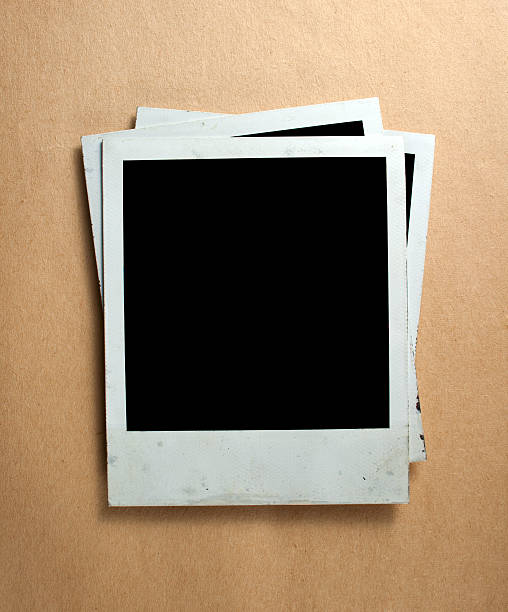 istock Old instant photos on old paper 495006533