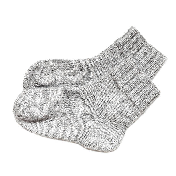 istock Gray woolen socks isolated on white background 495007787