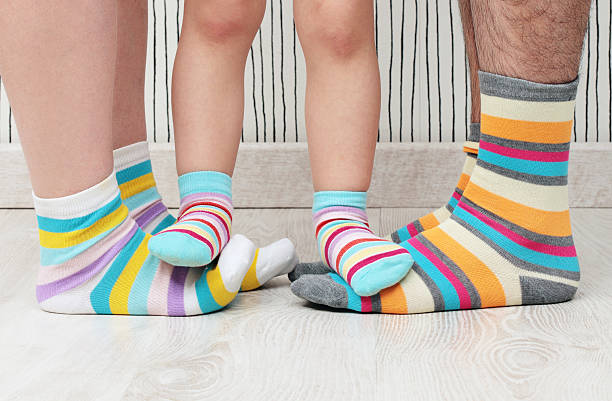 istock family in socks 495008473