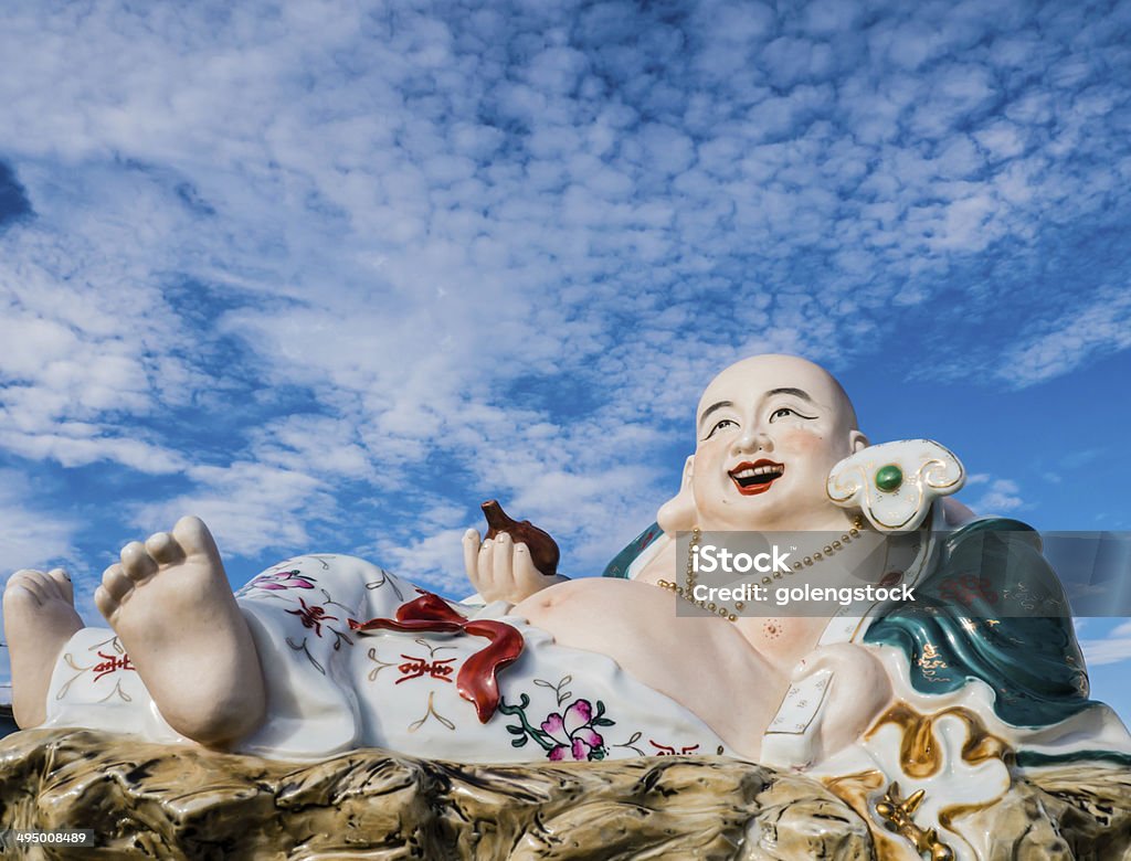 Chinese God of Happiness, Wealth and Lucky nice sky and the Chinese god of happiness statue Anthropomorphic Smiley Face Stock Photo