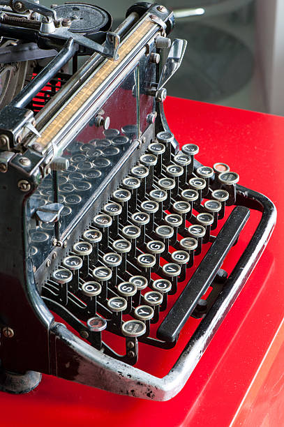 istock Old retro black metallic typewriter with antique round  keys. 495008721