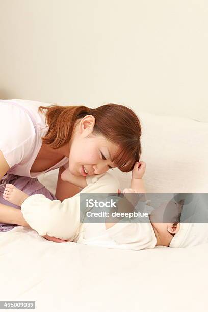 Diaper Exchange Stock Photo - Download Image Now - Asian and Indian Ethnicities, Baby - Human Age, Adult