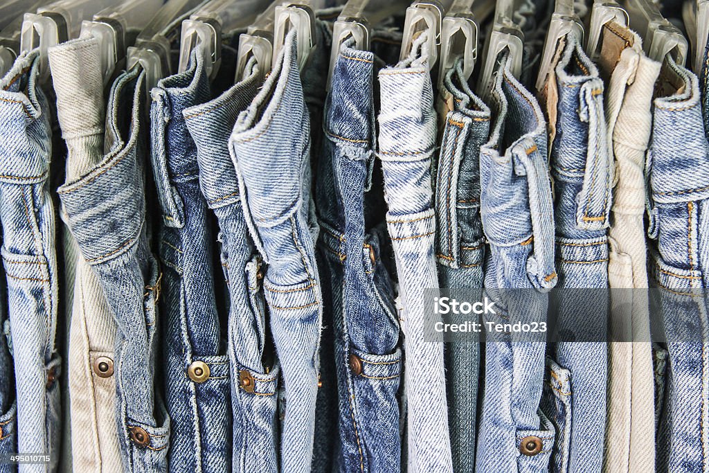 Daytime Reductor Crow Rack Of Second Hand Jeans Stock Photo - Download Image Now - Jeans, Denim,  Men - iStock