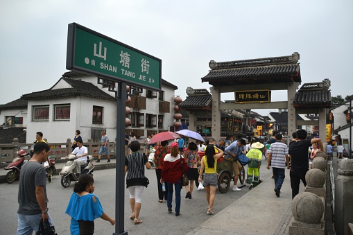 Suzhou, China - July 19, 2015: tourists walking on Shantang street in Gusu District, Suzhou.