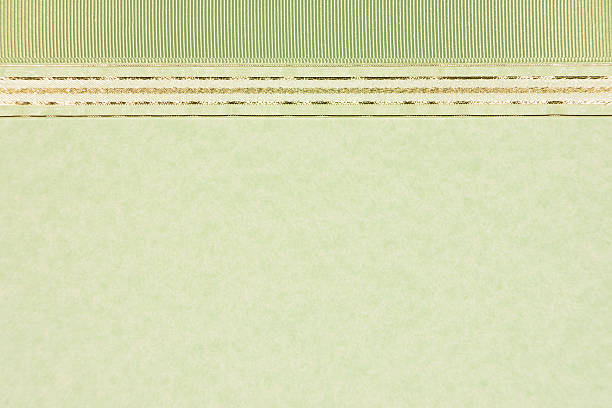 istock Green Paper Background with Gold Ribbon Border 495017162