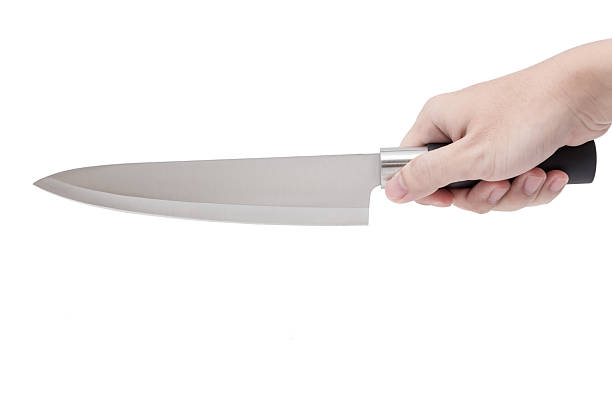 istock Hand is holding a knife isolated on a white background 495018326