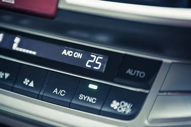 car's controlpanel in interior with air conditioning