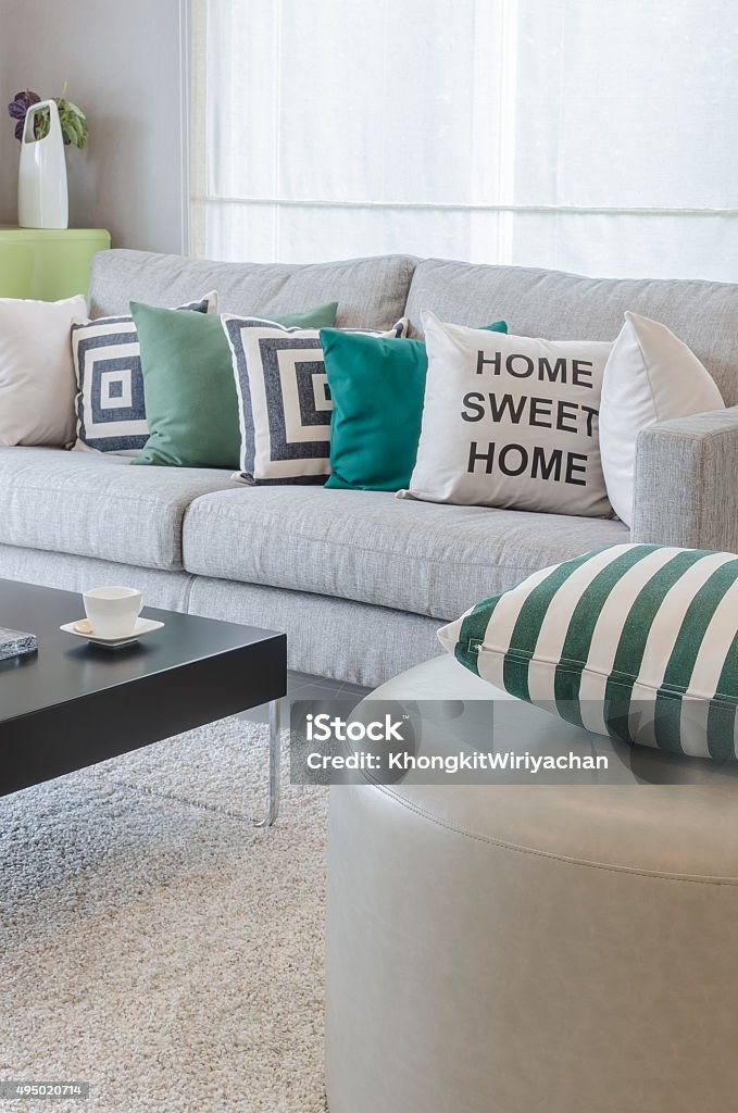 green and white pillows on round chair green and white pillows on round chair in modern living room 2015 Stock Photo