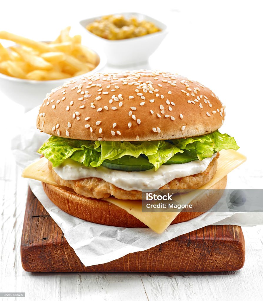 fresh chicken burger fresh chicken burger on wooden table Mayonnaise Stock Photo