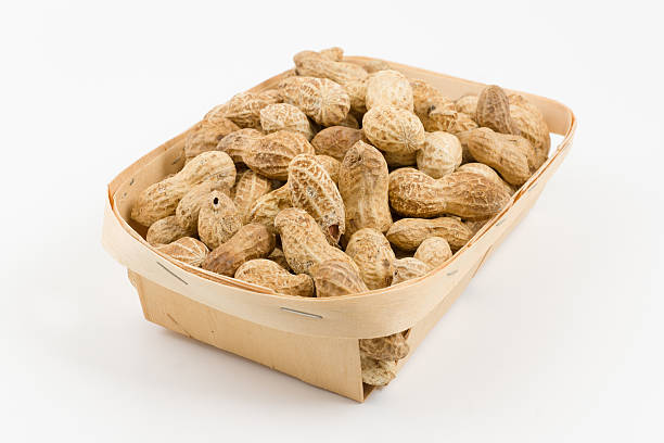 istock wooden container is filled with a peanut 495033948