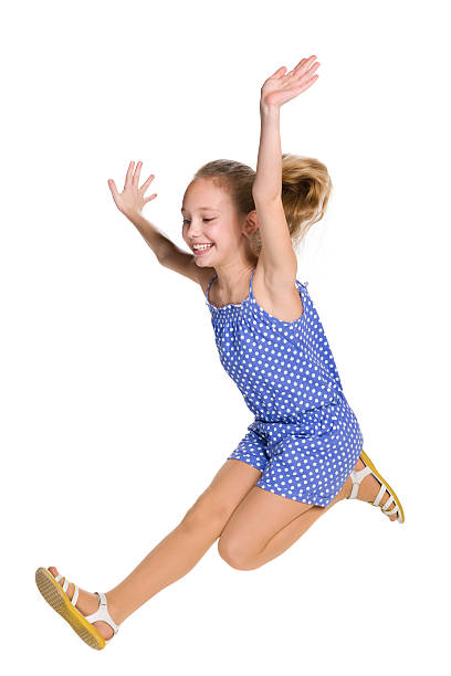 istock Happy girl jumps 495035644