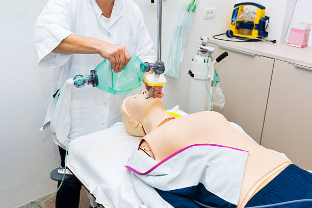 istock First aid CPR seminar,mechanical ventilation of dummy 495036244
