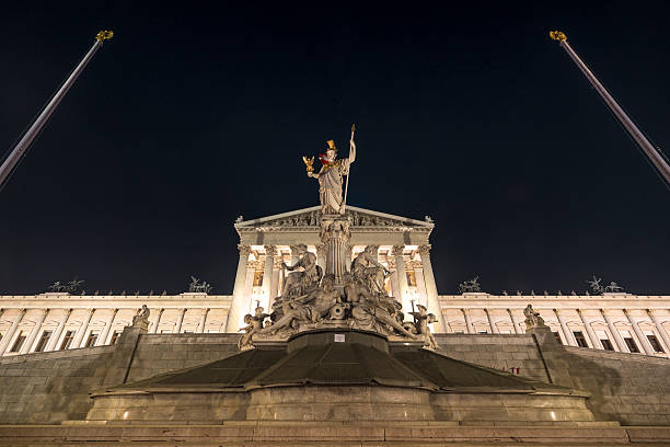 Austrian Parliament Building night autumn The Austrian Parliament Building (German: Parlament or Hohes Haus, formerly the Reichsratsgebauede) at night in autumn ringstraße boulevard stock pictures, royalty-free photos & images