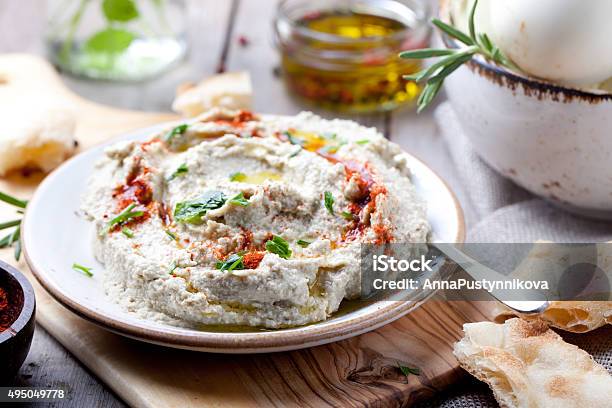 Traditional Arabian Eggplant Dip Baba Ganoush With Herbs Smoked Paprika Stock Photo - Download Image Now