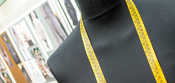 istock Dummy for tailor with a measure tape. 495050814