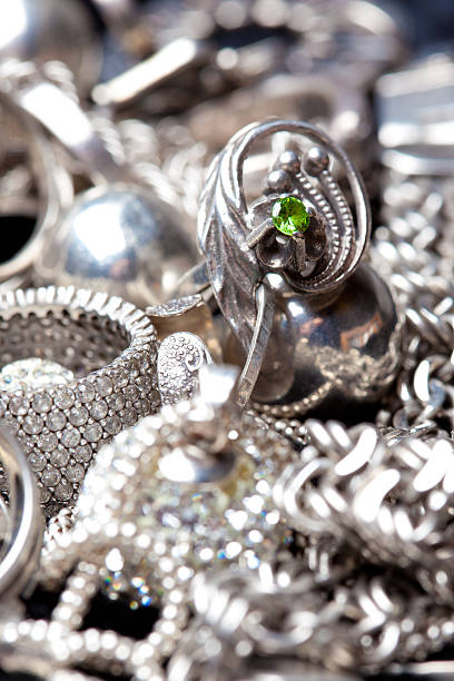 istock Silver jewlery on black background 495052546
