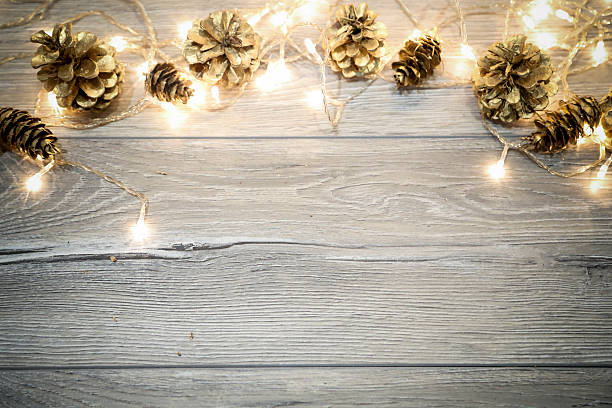 Christmas background with  cones on wooden table Christmas background with  cones on wooden table with copy space. winter still life stock pictures, royalty-free photos & images