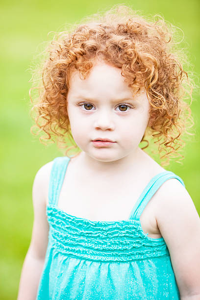 istock Girl With Curly Red Hair 495055663