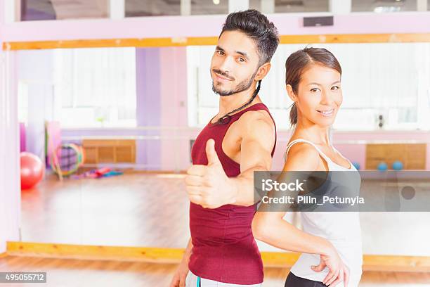 Young People Lead A Healthy Lifestyle Exercise In Fitness Room Stock Photo - Download Image Now