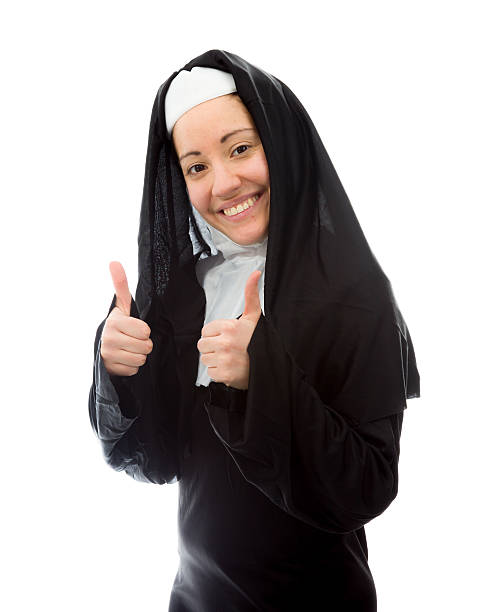 istock Young nun showing thumbs up sign with both hands 495056079
