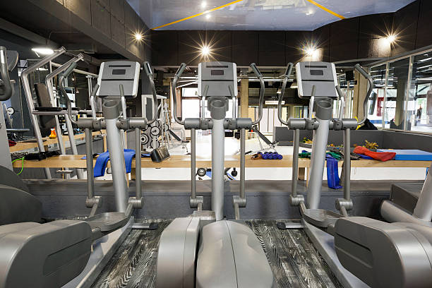 istock Elliptical machines in a gym 495057031