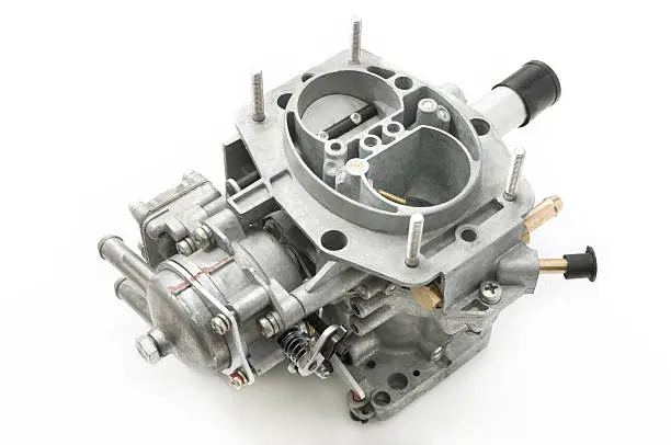 New carburettor on a white background