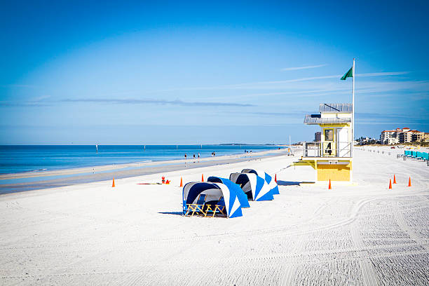 Clearwater Beach Morning A beautiful morning on Clearwater Beach.  The sky is blue and the sand is freshly raked. clearwater florida photos stock pictures, royalty-free photos & images