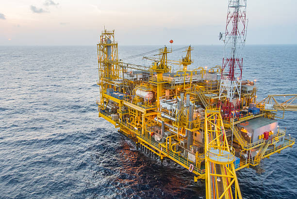 istock oil production platform on the sea 495059587
