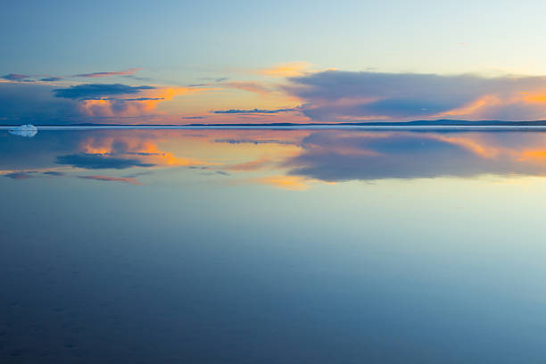 istock Melting spring mountain lake in the setting sun. 495059599