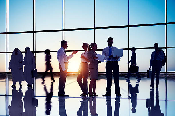 istock Silhouettes of Business People Working 495059991