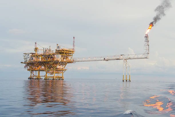 istock oil production platform on the sea 495060797