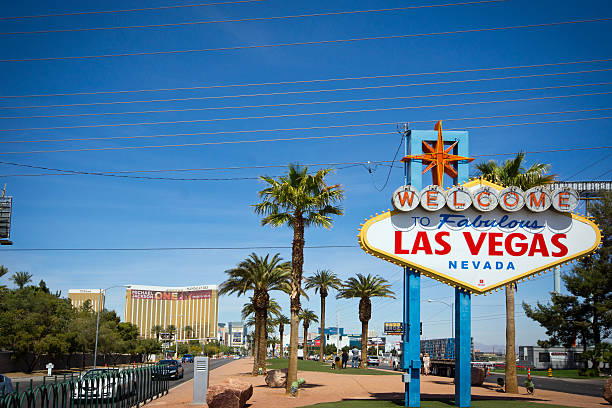Classic view of Welcome to Fabulous Las Vegas sign at the south end of world famous Las Vegas strip on a beautiful sunny day with blue sky and clouds, Las Vegas, Nevada, USA