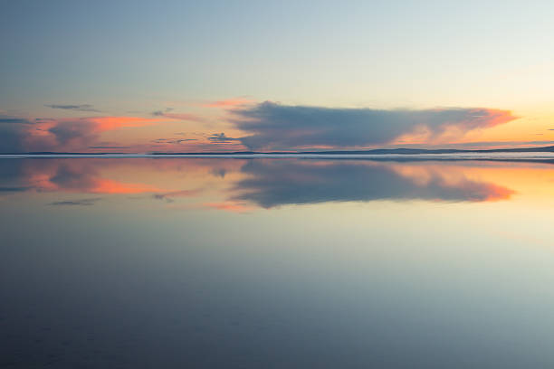 istock Melting spring mountain lake in the setting sun. 495060955