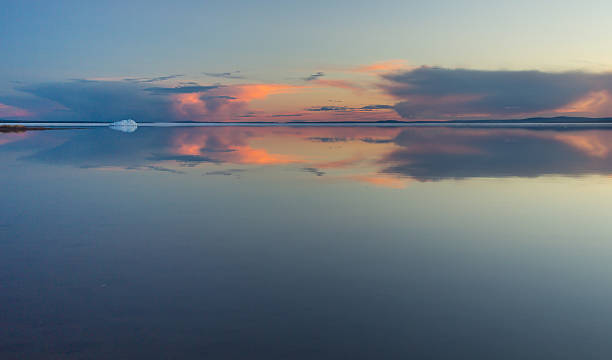 istock Melting spring mountain lake in the setting sun. 495061089