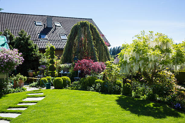 colorful flowers Garden and house in Lausanne stock photo