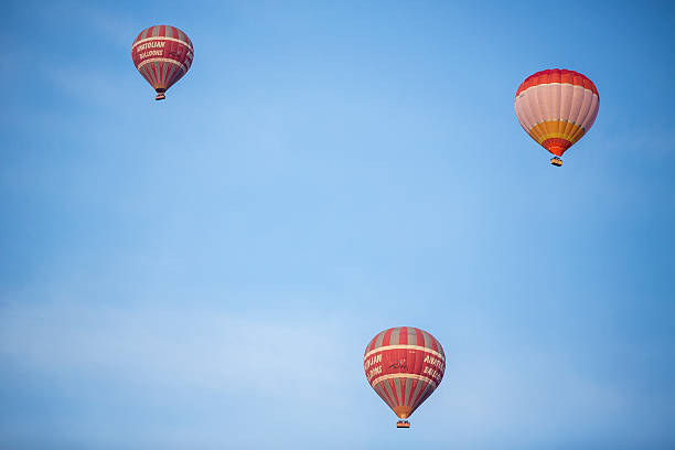 Hot air balloon in Cappadocia. Goreme, Turkey - April 5, 2014: Hot air balloon fly over Cappadocia, the best attraction for tourists. Goreme stock pictures, royalty-free photos & images