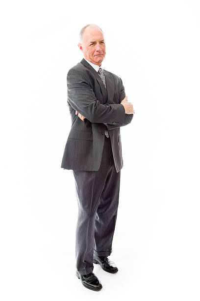 istock Businessman standing with hands crossed and thinking 495061905