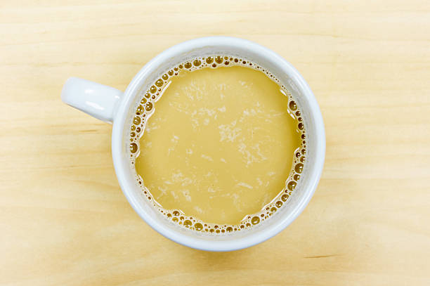 istock Cup of coffee spill on desk 495066150