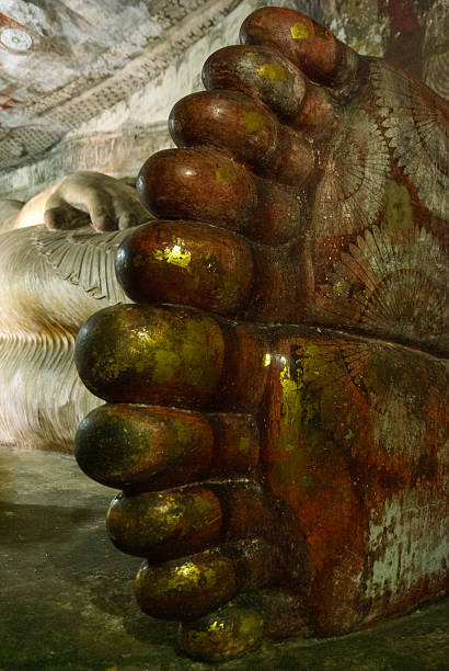 istock Closeup of Reclining Buddha Statue 495066684